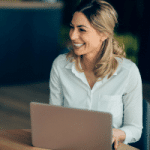 Smiling mom planning a homeschool schedule